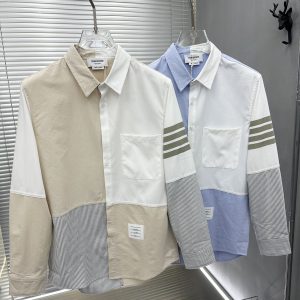 톰브라운(Thom Browne)의 믹스 미디어 컬러 블록 셔츠